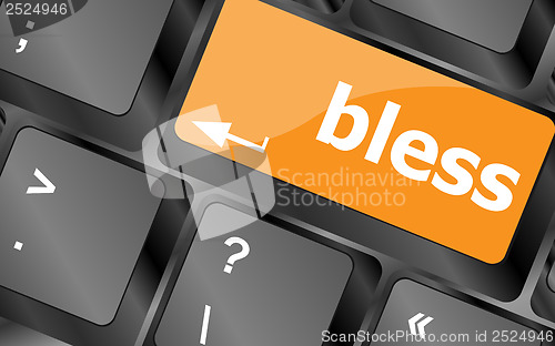 Image of bless text on computer keyboard key - business concept