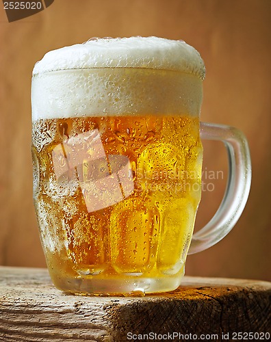 Image of Frosty glass of light beer