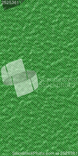 Image of Liquid metal blot on green background