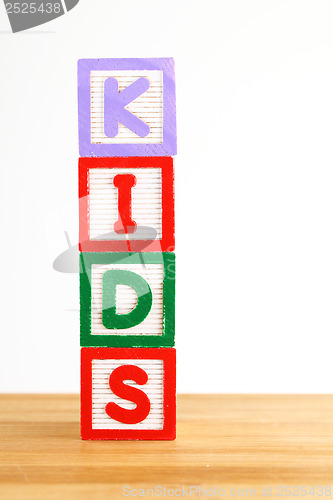 Image of Alphabet building blocks that spelling the word kids