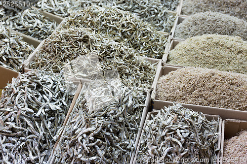 Image of Dried assorted anchovy fish for sell in market