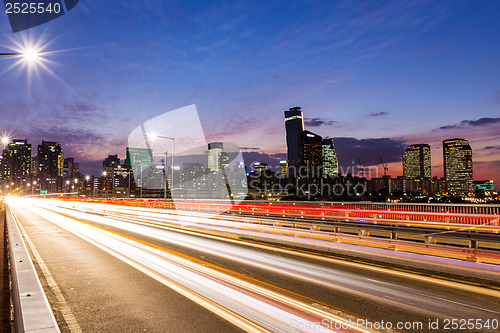 Image of Busy traffic in modern city