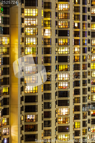 Image of Exterior of apartment building at night