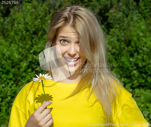 Image of woman with camomile
