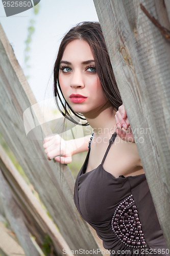 Image of Young thoughtful brunette