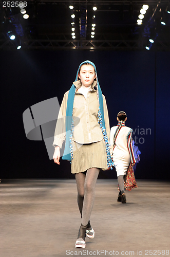 Image of Asian model on the catwalk during a fashion show - EDITORIAL ONL