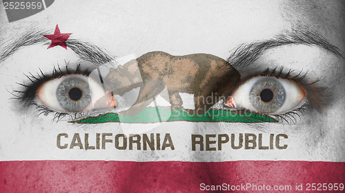 Image of Close up of eyes with flag