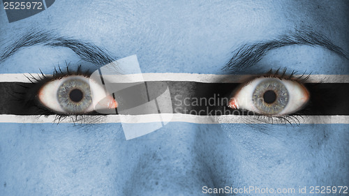 Image of Close up of eyes with flag