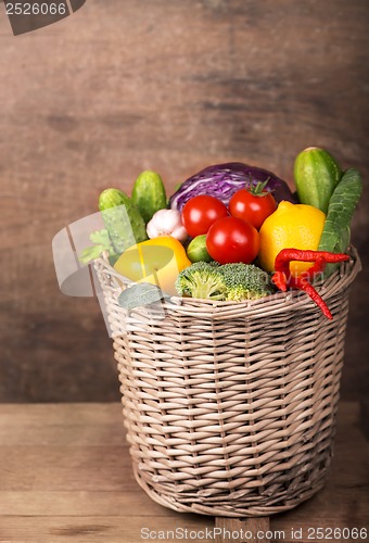 Image of Healthy Organic Vegetables on a Wooden Background