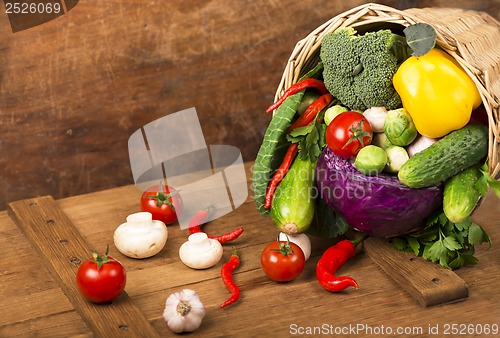 Image of Healthy Organic Vegetables on a Wooden Background