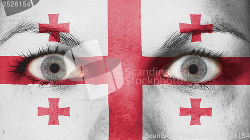 Image of Close up of eyes with flag