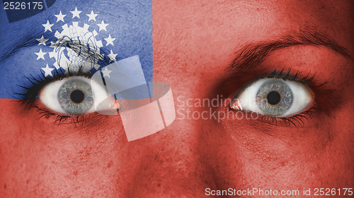 Image of Close up of eyes with flag