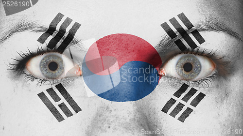 Image of Close up of eyes with flag