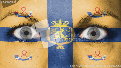 Image of Close up of eyes with flag