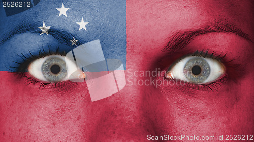 Image of Close up of eyes with flag