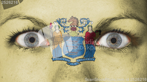 Image of Close up of eyes with flag