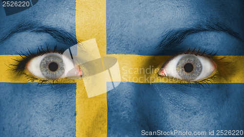 Image of Close up of eyes with flag