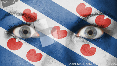 Image of Close up of eyes with flag