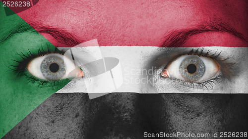 Image of Close up of eyes with flag