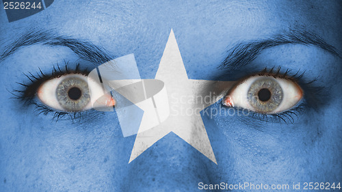 Image of Close up of eyes with flag