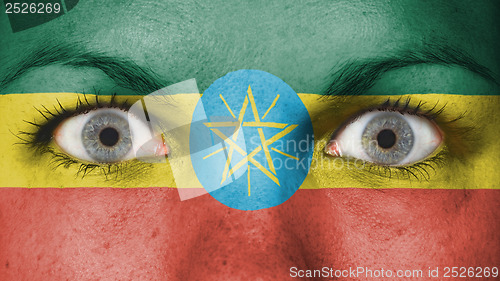 Image of Close up of eyes with flag