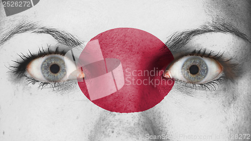 Image of Close up of eyes with flag