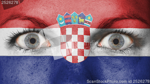 Image of Close up of eyes with flag