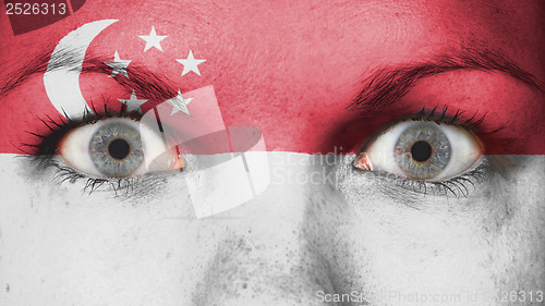 Image of Close up of eyes with flag