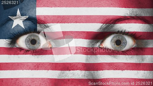 Image of Close up of eyes with flag