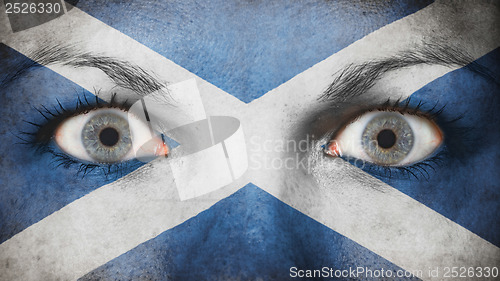 Image of Close up of eyes with flag