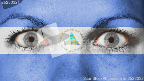 Image of Close up of eyes with flag