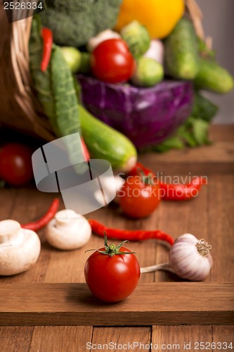 Image of Healthy Organic Vegetables on a Wooden Background