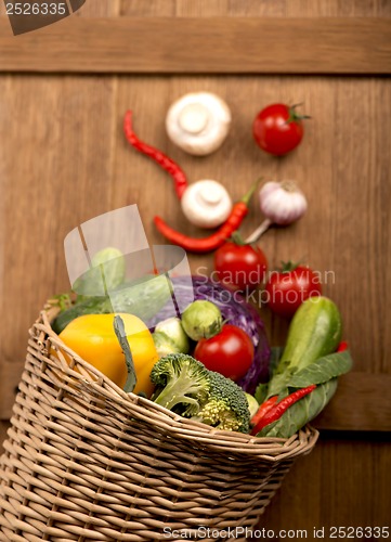 Image of Healthy Organic Vegetables on a Wooden Background