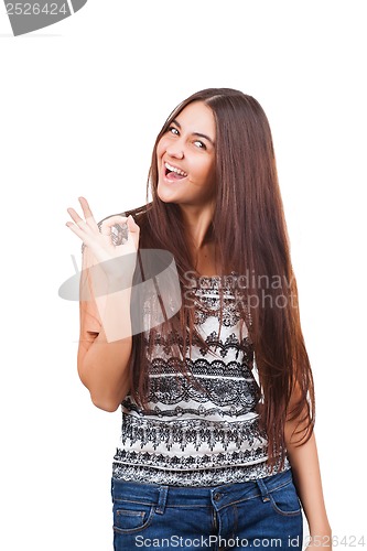 Image of Attractive young woman showing ok sign