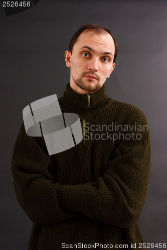 Image of man in an old sweater