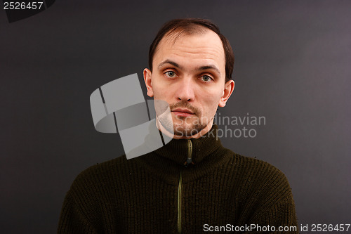 Image of man in an old sweater