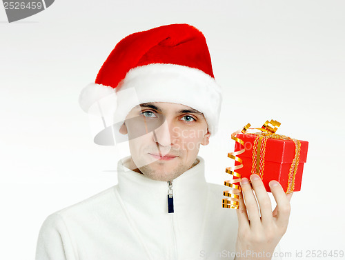 Image of man in a Santa hat with Christmas gift