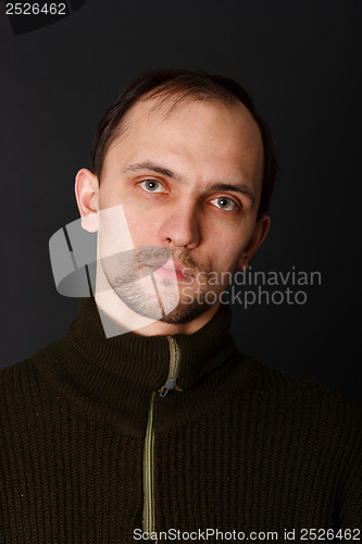 Image of man in an old sweater