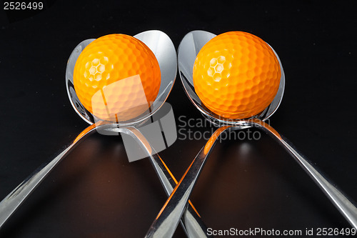 Image of Sponns and golf balls