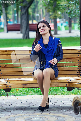 Image of Girl sitting in the park