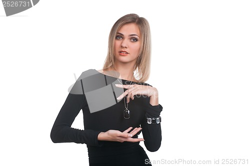 Image of Portrait of trendy blonde woman in black dress