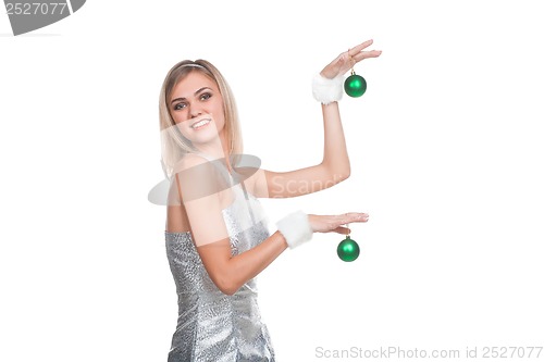 Image of Blond girl in christmas costume and decor