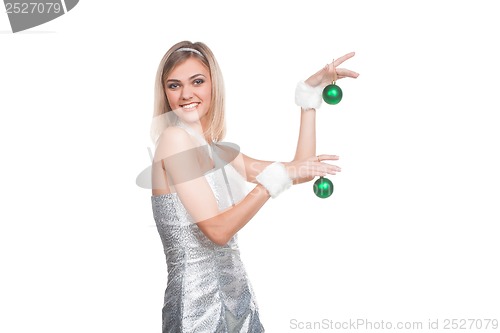 Image of Blond girl in christmas costume and decor