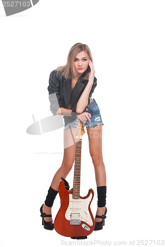 Image of Young woman with guitar on white background