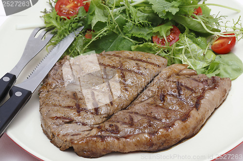 Image of Low carb steak and salad with cutlery