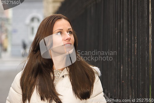 Image of Lady by the fence