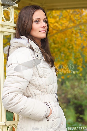Image of Leaning lady in gazebo
