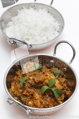 Image of Methi chicken and rice in kadai bowls vertical