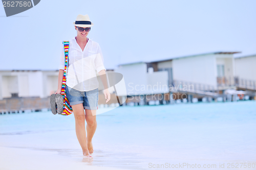 Image of beautiful woman on beach have fun and relax