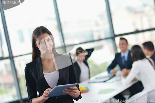 Image of business people group in a meeting at office